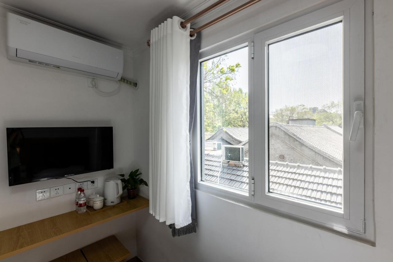 Happy Dragon Hotel -- Nearby Tiananmen Square & Forbidden City & Wangfujing Street & Line 5,6,8 Subway Nearby & Free Coffee & Free Laundry & Fluent English Speaking & Tourist Attractions Ticket Service & Free Wifi Unlimited For Western Software Pekin Dış mekan fotoğraf